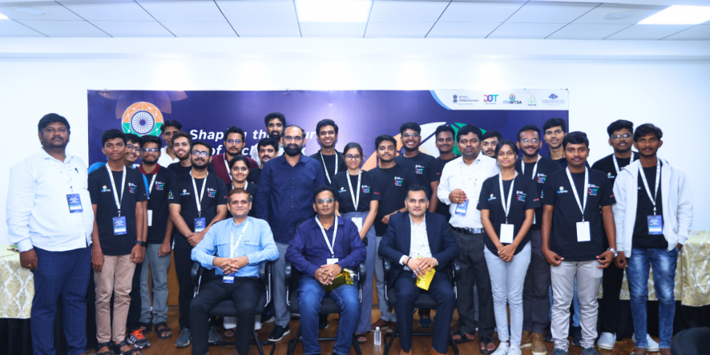 Delegates and organizers group photo at hackathon summit